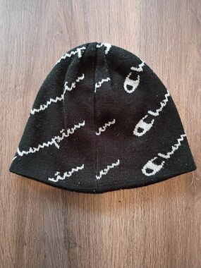 Champion Black Beanie w/Champion lettering  it’s reversible-black with logo